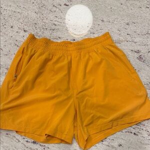 Lululemon Pace Breaker Bright Orange Athletic Shorts